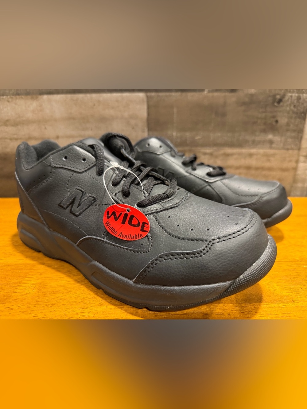 New Balance Woman’s Black Lace-Up Leather Sneaker